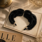 Load image into Gallery viewer, Aros Clip Pluma Negra. Años 60