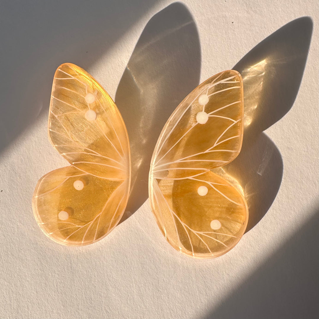 Aros Ilustración Mariposa Dorada Translúcida XL