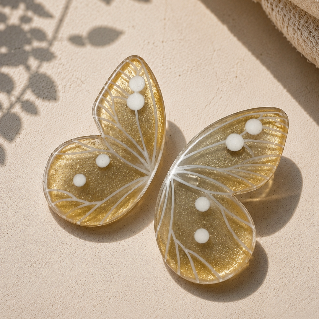 Aros Ilustración Mariposa Dorada Translúcida M 5cm